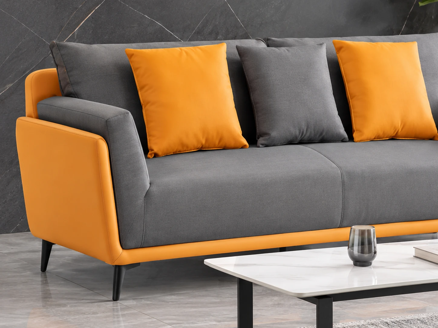Bộ sofa xám cam với ghế văng, ghế đơn và bàn trà trong không gian nội thất